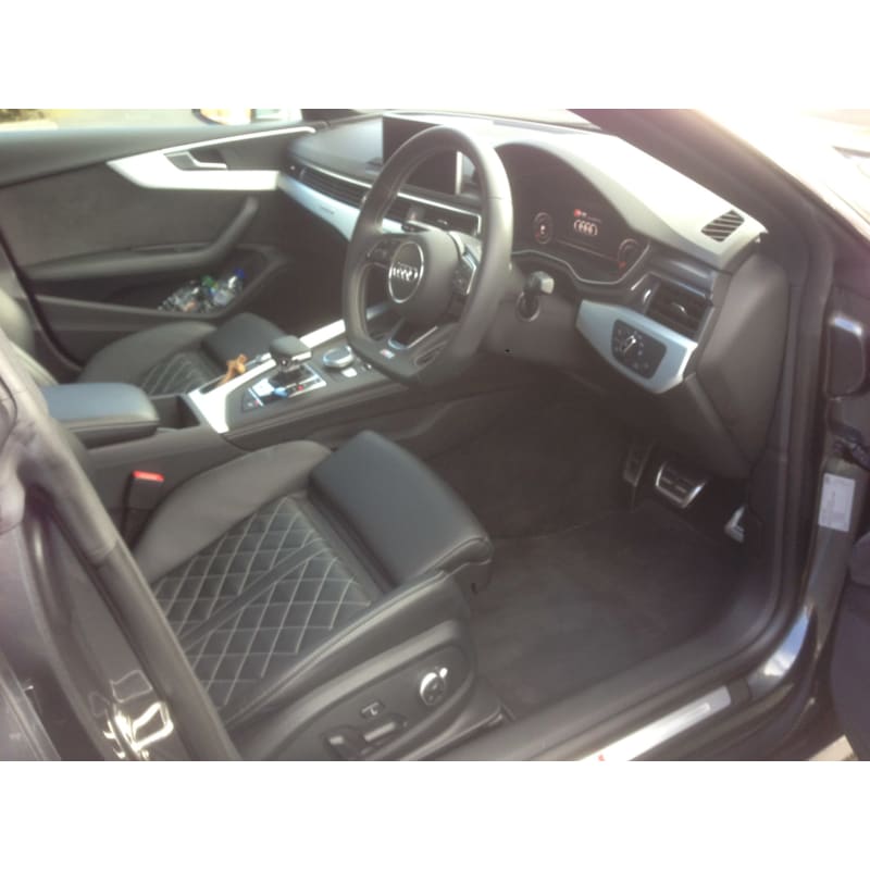 Black Audi, rear