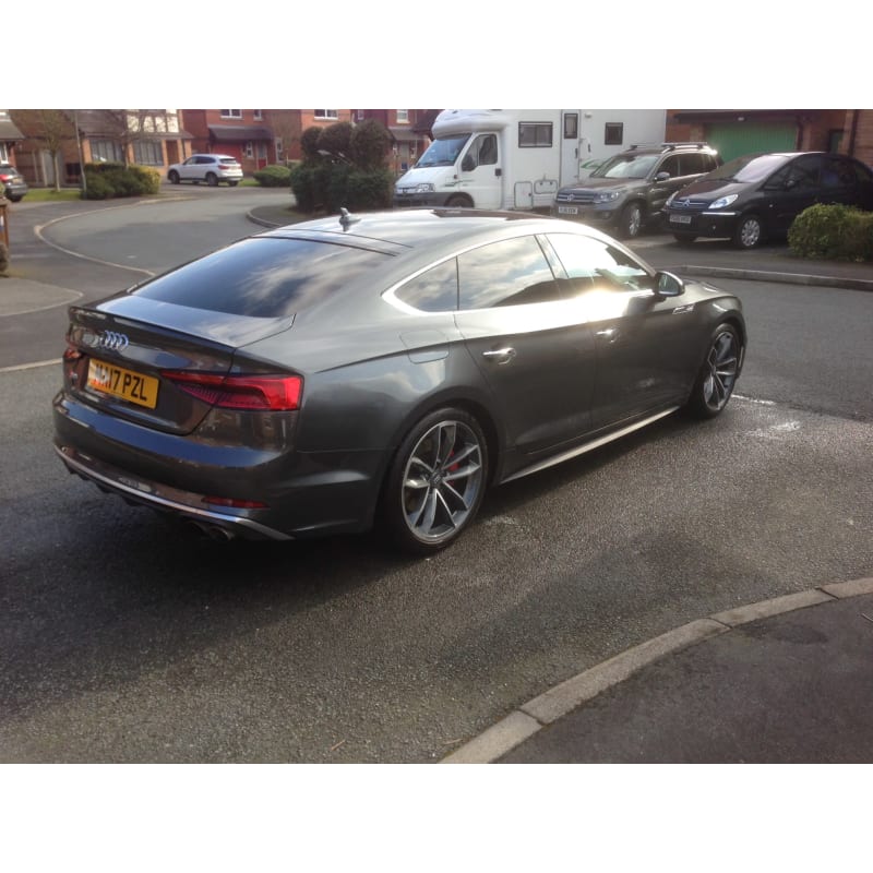 White Audi, rear